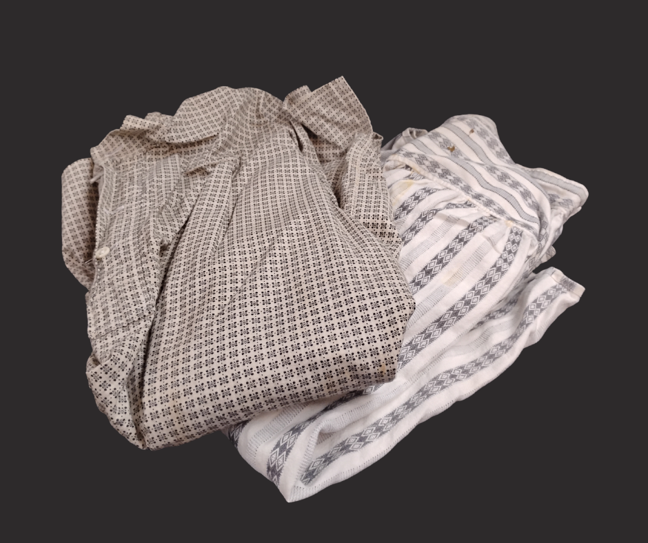 Two folded shirts with small patterns.