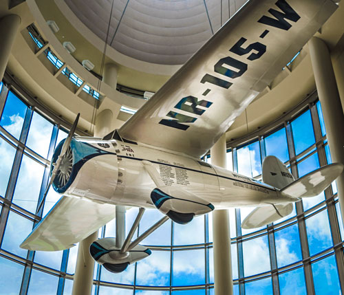 Replica of the Winnie Mae airplane hanging in the Oklahoma History Center atrium.